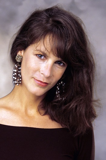 Jamie Lee Curtis' Long Curled Hairstyle with Bangs